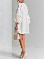 Elegant Amara Mini Dress with Floral Buttons